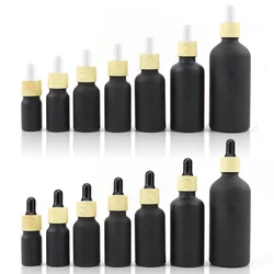Wholesale 5mL 10mL 15mL 20mL 30mL 50mL 100mL Matte Frosted Black Dropper Bottles With Bamboo Cap Calibrated Glass Pipette