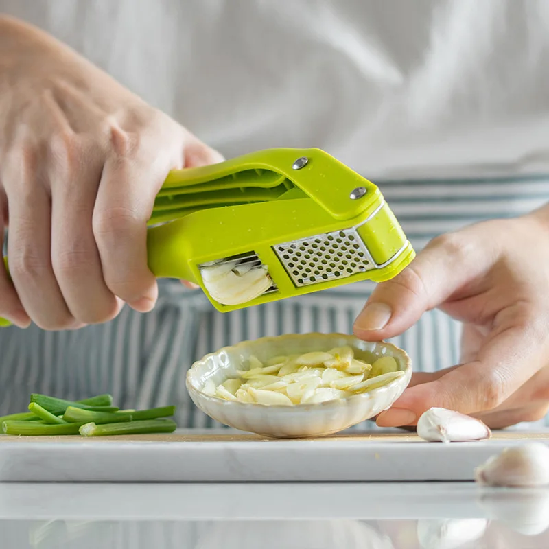 New 2-in-1 Kitchen Garlic Press and Cutter Household Fruit & Vegetable Tools for Pitting Garlic Fillets and Mixers