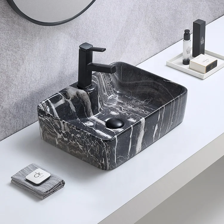 Элегантная настольная художественная раковина с каменным дизайном для ванной комнаты керамическая мраморным узором ручная