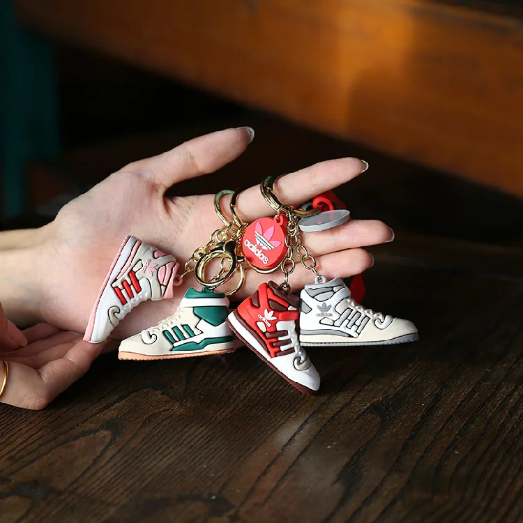 Wholesale Cartoon Creative Trend Ad Artificial Pendant Sports Sneakers Keychain Push Opening Small Gift