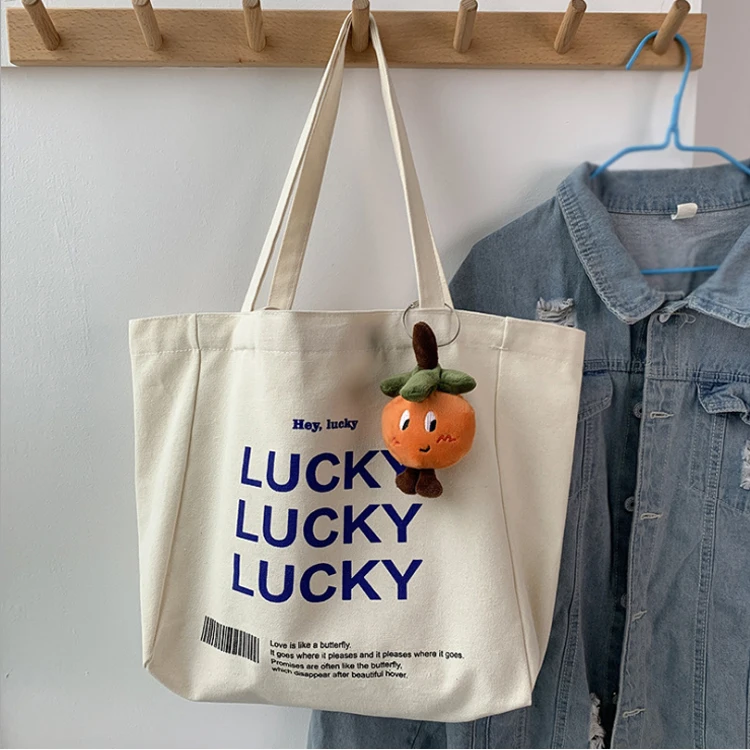 Wholesale high quality plain organic reusable fashionable custom design print cotton canvas tote bag shopping bag with logo