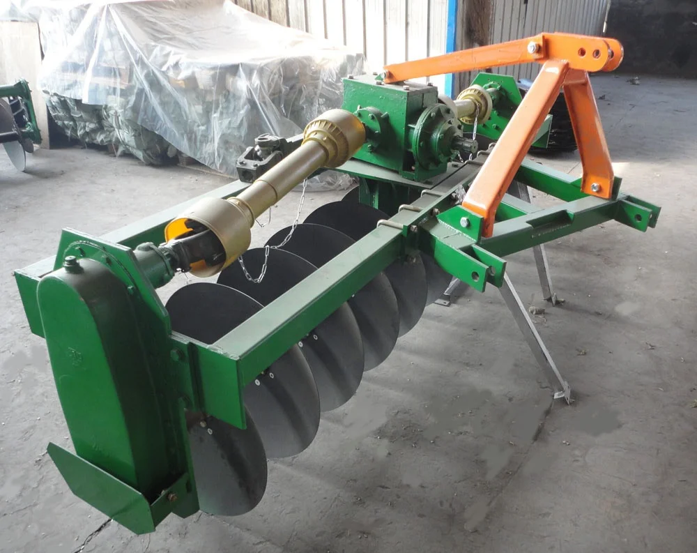 agricultural tractor rotary driven disc plough