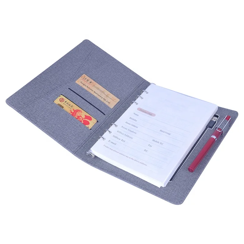 China Factory 8000mah wireless charging planner power bank notebook with phone pocket and usb