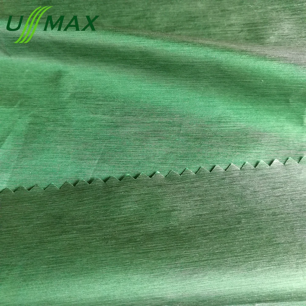 
20d Nylon polyester two color tones shiny taffeta calendering fabric for down proof jackets wears 