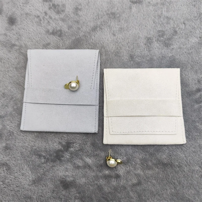 Yongchuangxin Promotion Microfiber Fabric Embossed Envelope Bag Jewelry Pouch With Logo