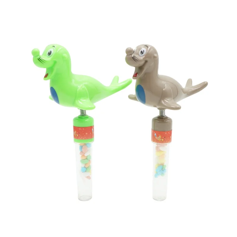 Hot selling plastic shaking whistle sea lion with candy tube marine animal candy toys for kids playing display box