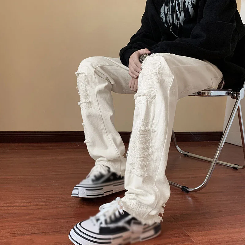 XINGKONG White Pants for Men - High Street Ripped Jeans with Slim Straight Leg and Flare Design