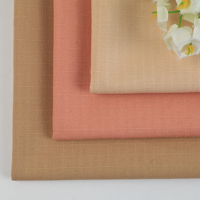 Wholesale plain-dyed woven thick strand beaded canvas lattice 100% cotton fabric for coat pants bags