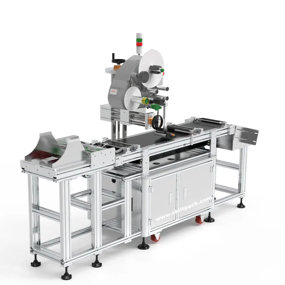 Automatic feeding label applicator for empty bags