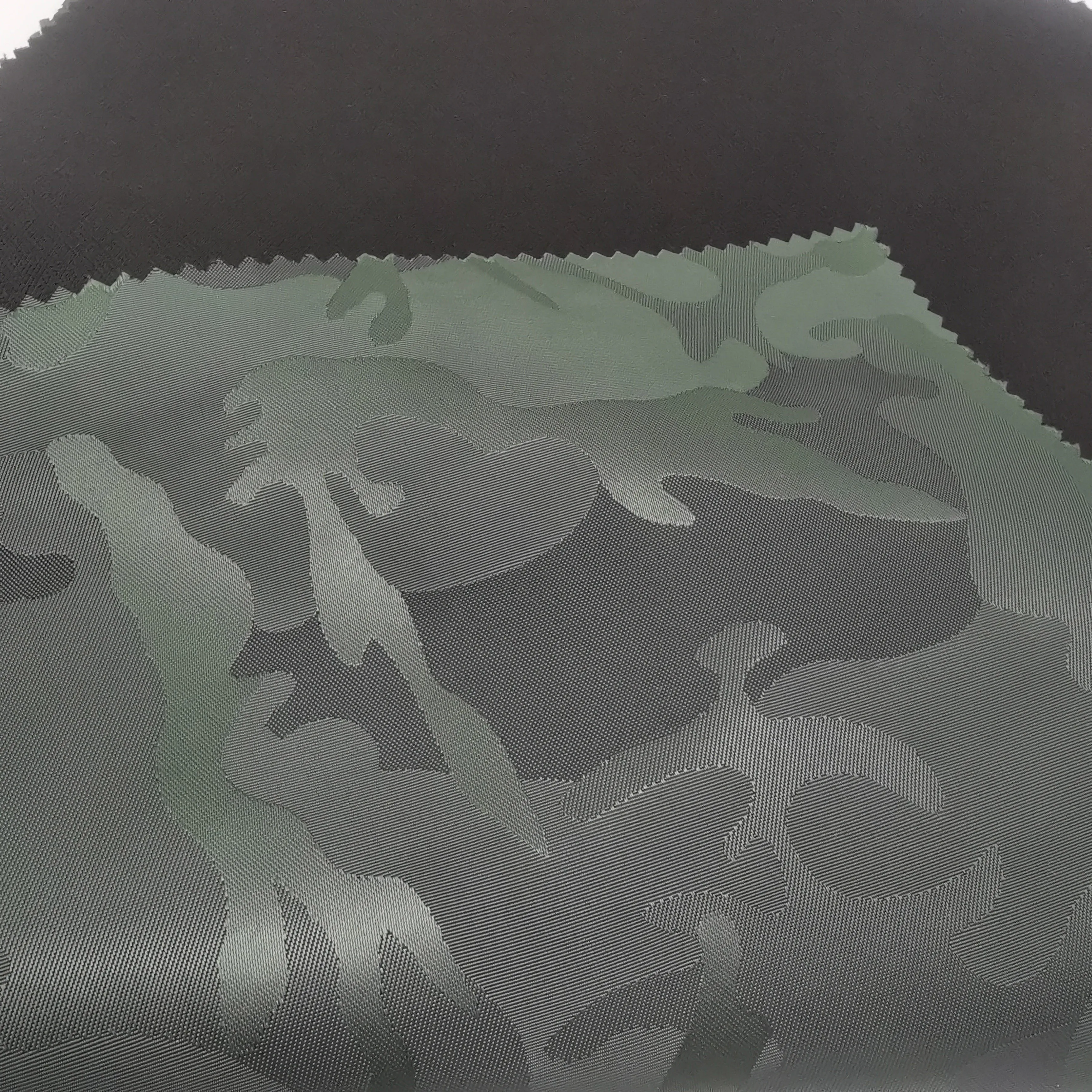 hot-selling camouflage jacquard Oxford fabric bonded knitted fabric with backpack