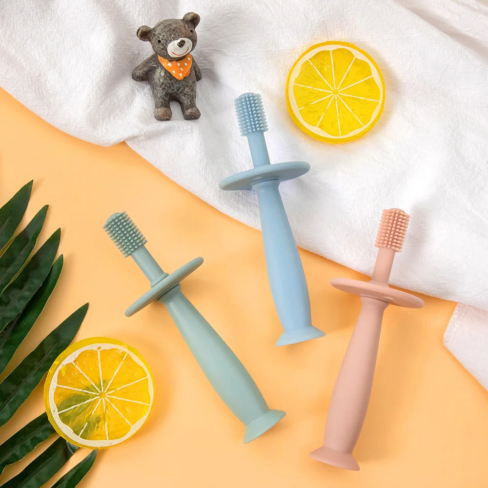 Wholesale New Design 360 Degree Cleaning Manual Food Grade Silicone Teether Toothbrush With Suction