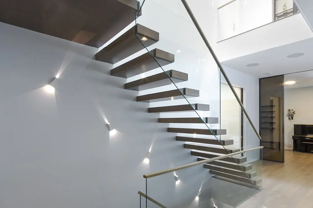 Hidden stringer staircase modern wood glass floating staircase