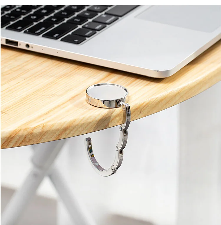 Оптовая продажа, индивидуальная портативная настольная Вешалка из сплава и цинковой смолы с логотипом, круглая форма, держатель для сумок