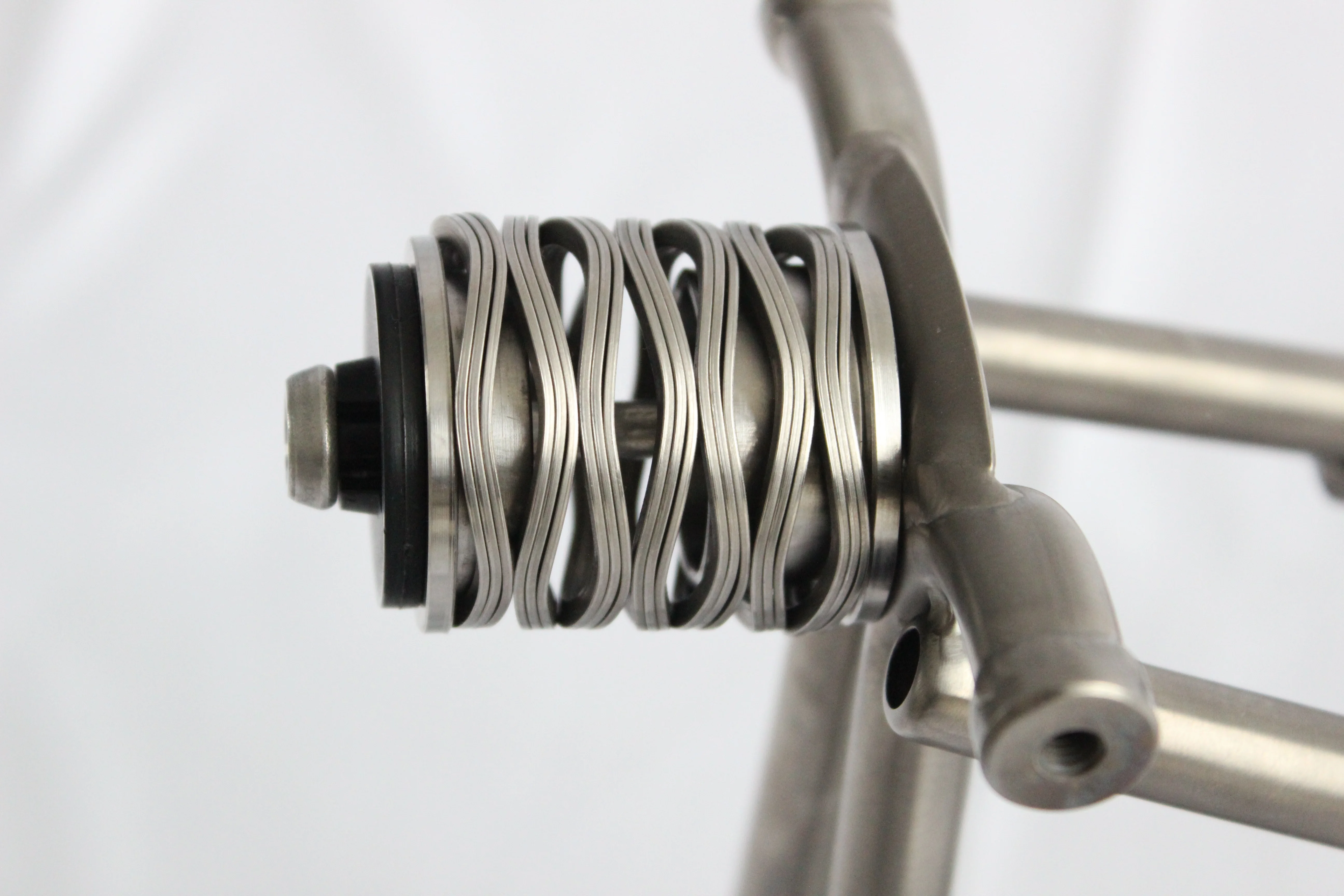 titanium folding bike suspension with spring