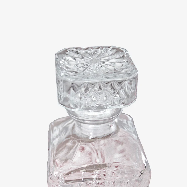 Embossed square 1000ml wine glass bottle glass spice honey jar packaging with glass lid with pp pad