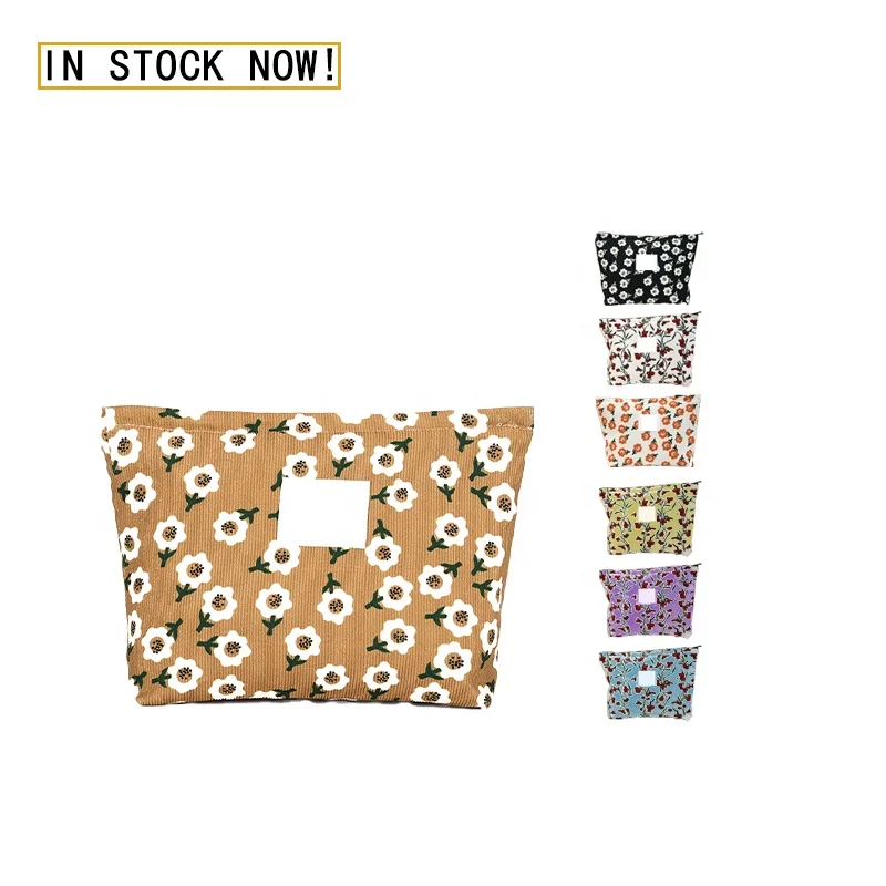 Женская косметичка с цветочным принтом