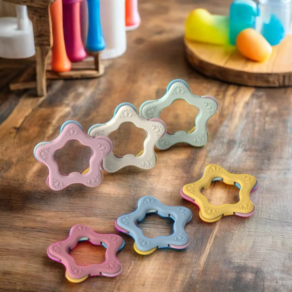 Wholesale Laser brand BPA Free Chewable Teething Toy Star shape Spinner Silicone Baby Teethers Toy