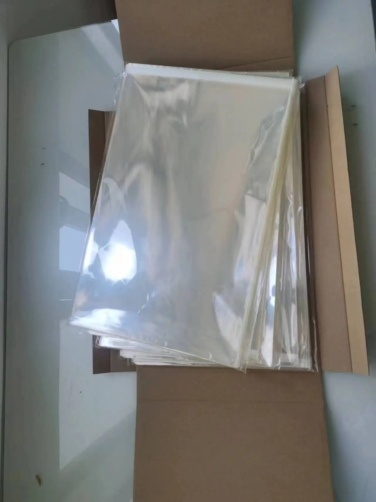 customize Clear Transparent OPP Self-Adhesive Plastic Poly Bag with Flap use for Packaging poster, comic book bag