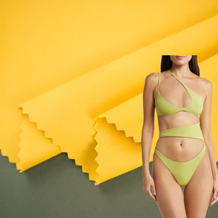 Wholesale 210GSM 79% polyamide 21% elastane knitted 4 way stretch buttery soft swimwear fabric for tops