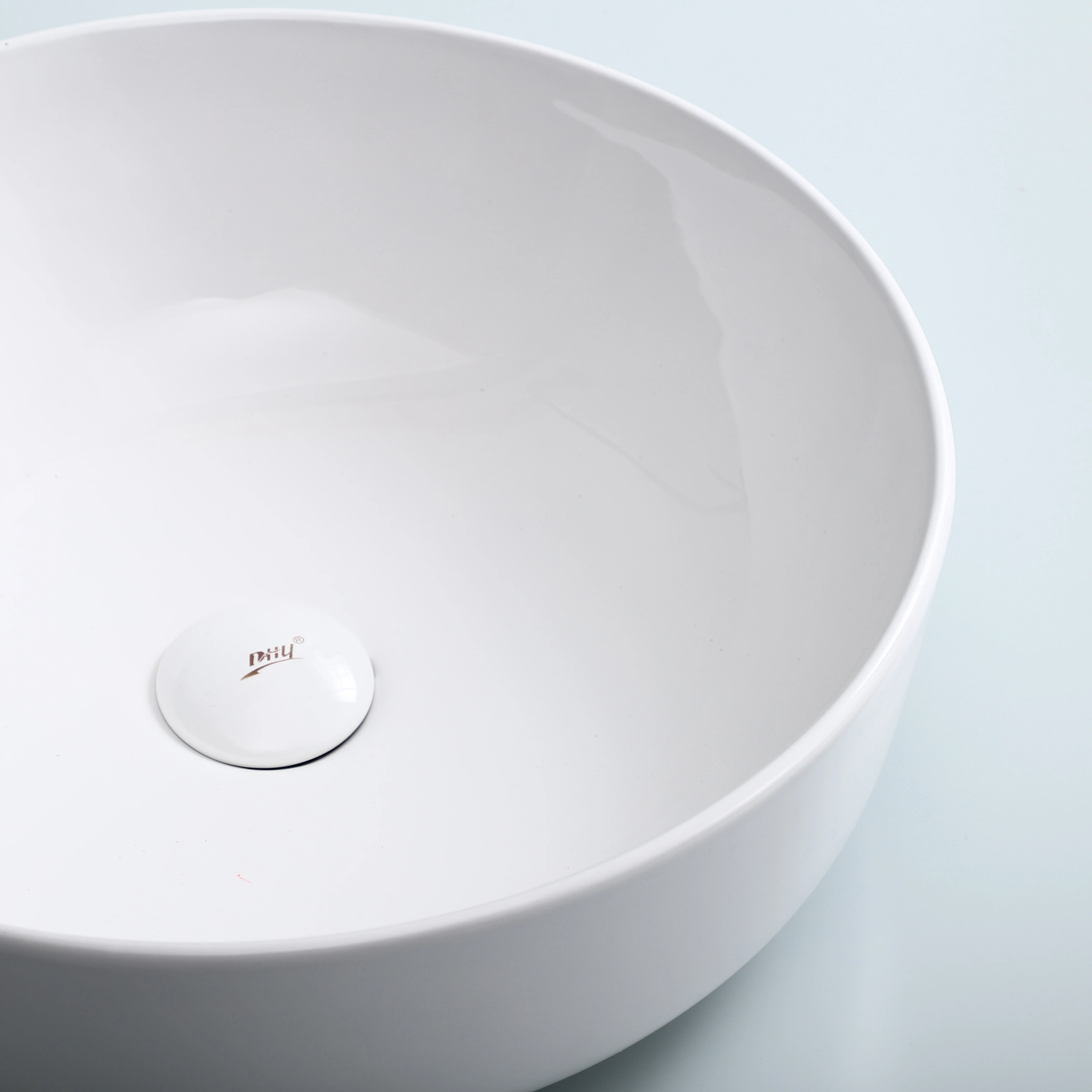 Customized small size popular hotel countertop bathroom hand washing sink sanitary ware ceramic round basin bowl art basin