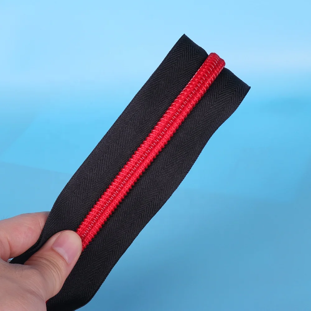 
YUANXING Wholesale Nylon Long Chain Zipper In Rolls Black Cloth Red Teeth # 8 Nylon Zipper 