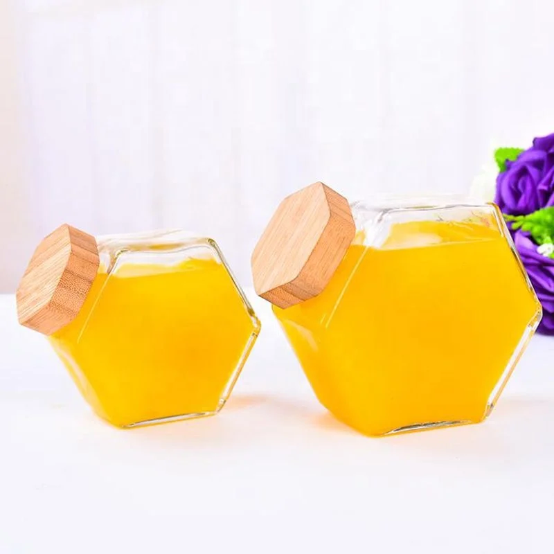 Custom 220ml unique hexagon glass honey storage jar with honey stick and wooden lid
