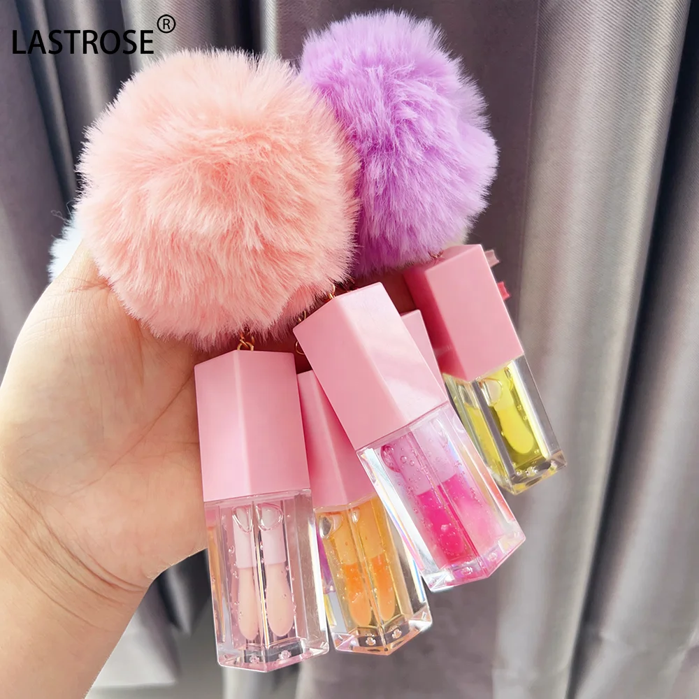 Wholesale Watermelon Lip Plumping Brown Tinted Lip Glow  Coconut Oil Flavouring pink Lip Oil with Pompon Private Label