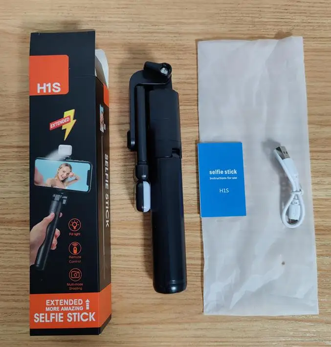selfie stick extendable up to 100cm with built-in wireless button tripod equipped with remote control for taking pictures