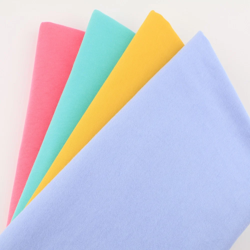 21S 180GSM 26S 160GSM чесаное трикотажное однотонное 100% хлопчатобумажное полотно для одежды футболок