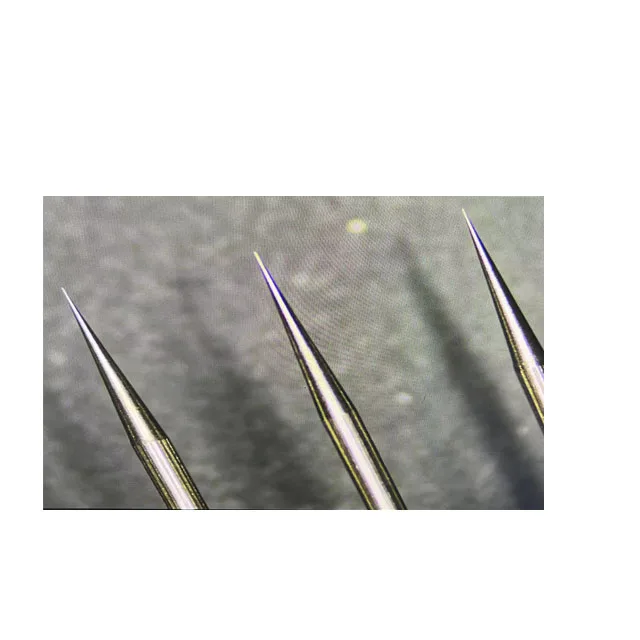 Tungsten chew ionizer emitter pin