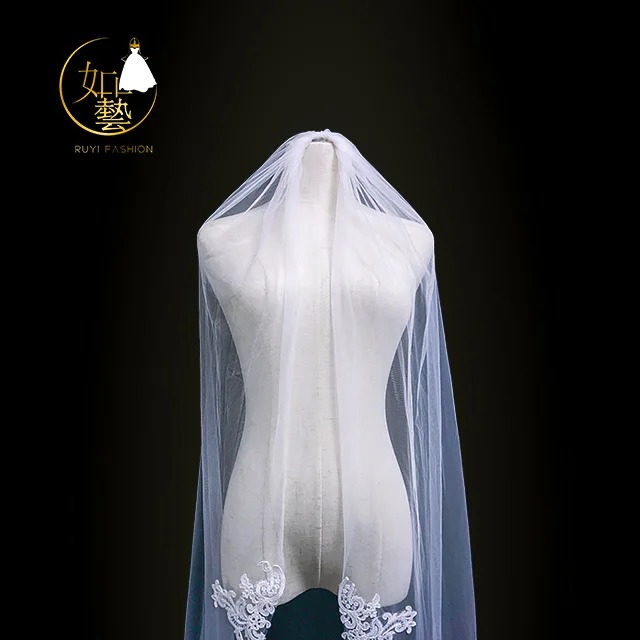 Applique ivory wedding dress shop with long veil