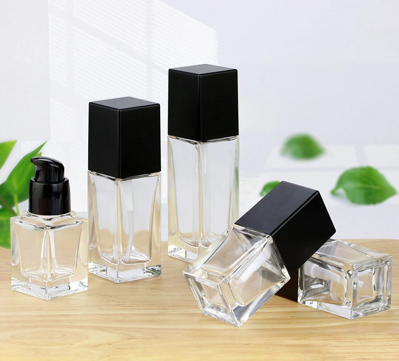 Beautiful empty 30ml cosmetic glass lotion bottles with pump dispenser