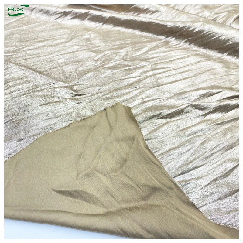 Manufacturers custom wholesale high quality luxury soft polyester silky metal yellow shiny satin fabrics for clothing women