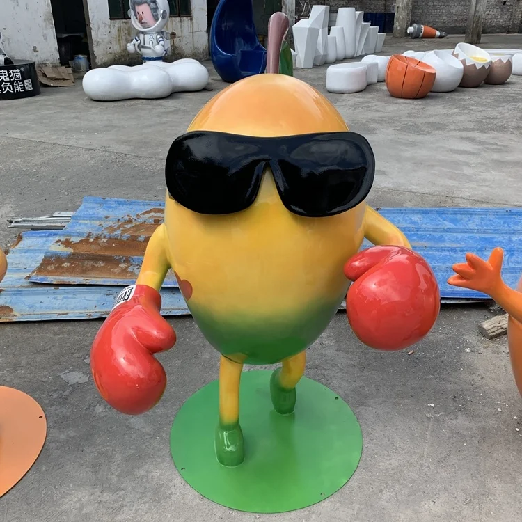A cartoon sculpture of a glass fiber reinforced plastic mango Fruit model ornaments Outdoor cartoon  Resin fiber figuresculpture