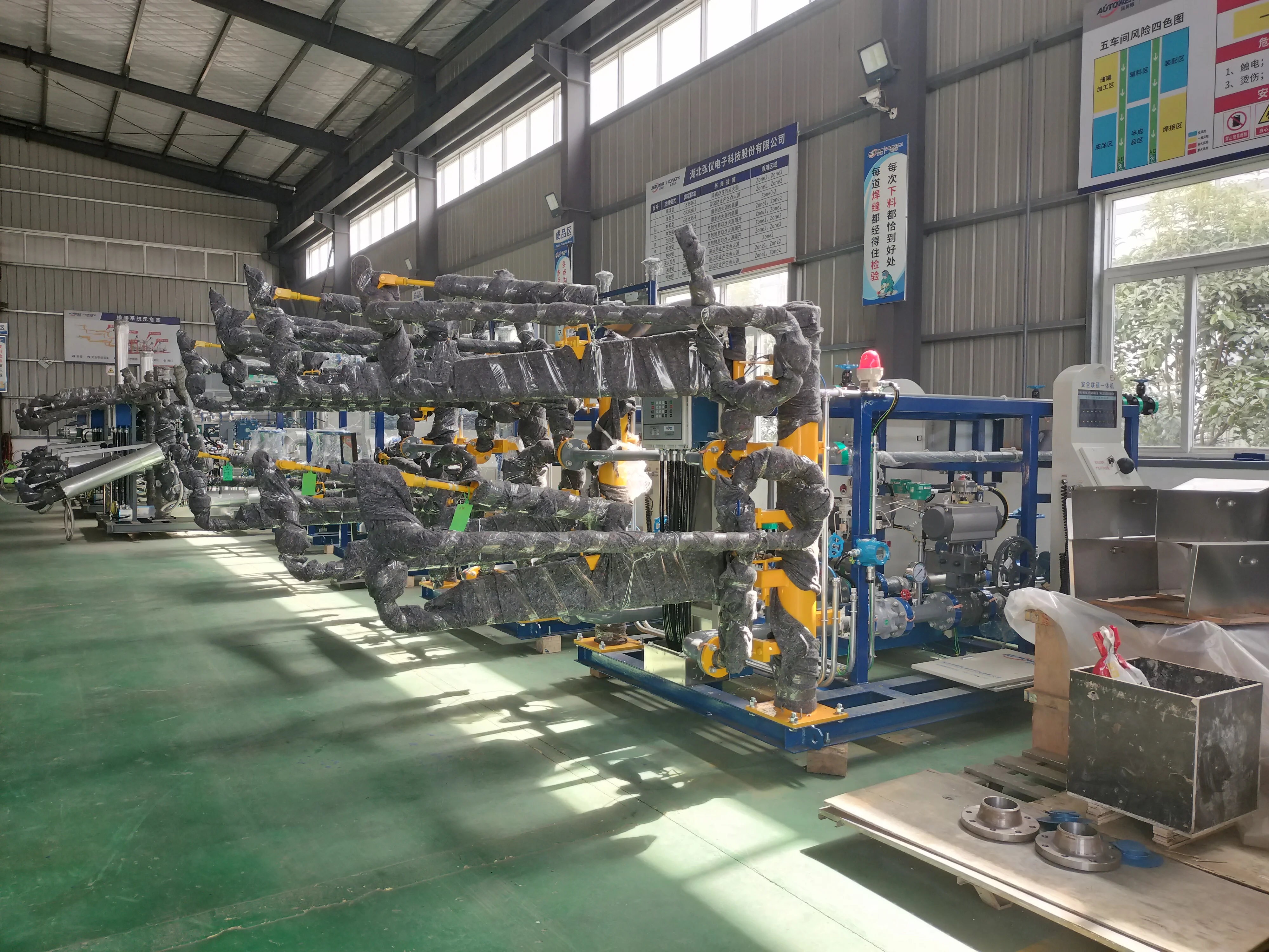 Multi-station hydrogenation metering skid mounted filling system with loading arm for loading/unloading chemical liquid