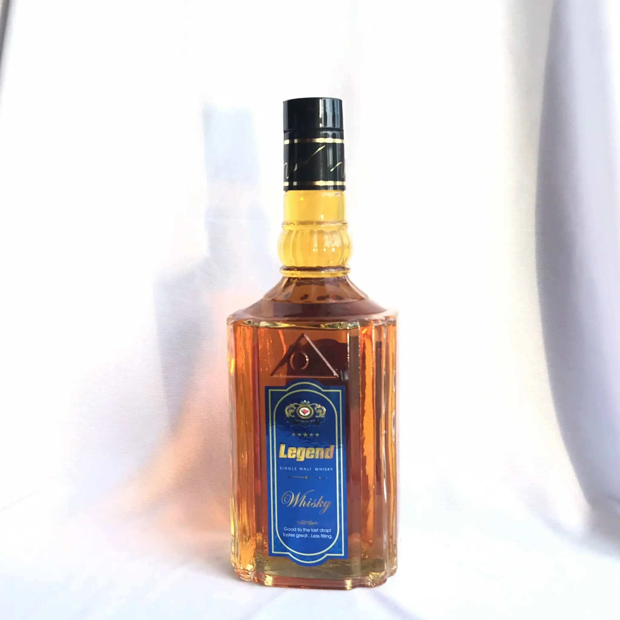 Legend Blue Whisky Bottle With Alcoholic Beverage Grains And Herbs Blended Grain Whisky