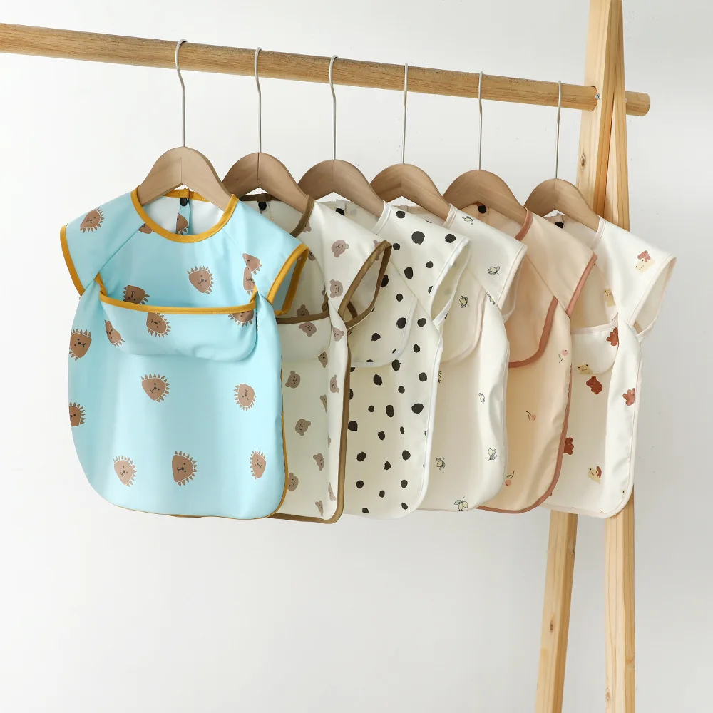 Custom Printed Solid Baby Bib Waterproof Solid Print PU Feeding Bib with Pocket short Sleeve Child Apron Smock