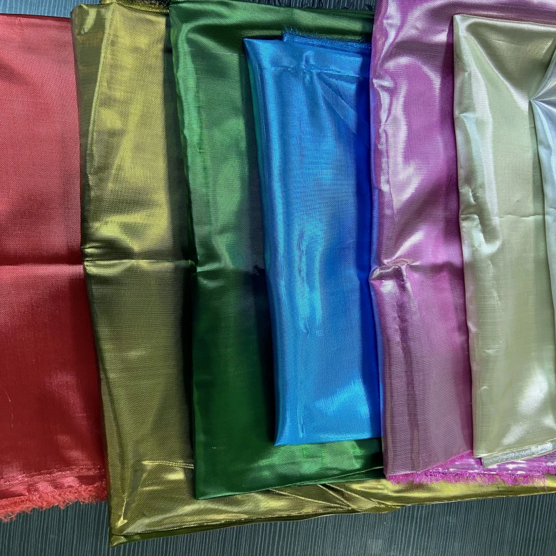 Wholesale Polyester Yarn Dyed Woven Gold And Sliver Liquid Metal Lame Fabric For Dance Flags