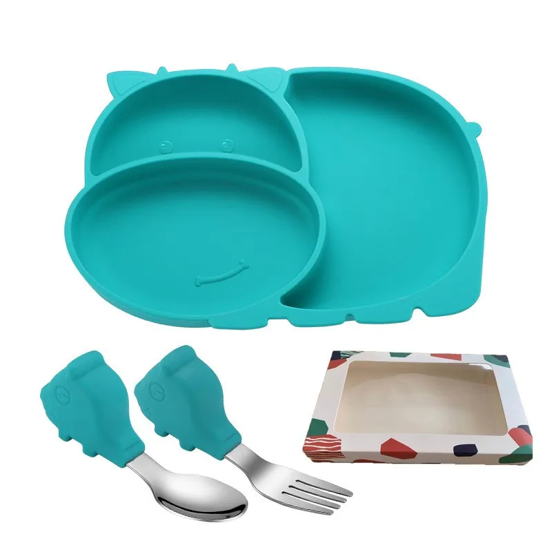Baby with suction cup and compartmentalized silicone complementary food bowl, fork and spoon set