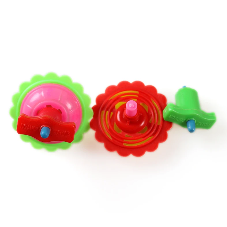 Wholesale Cheap Mini Plastic Winding Pinner Top Toy Import From China