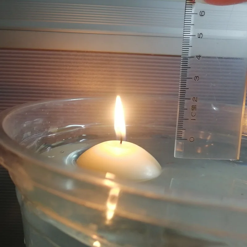 Hot sale real wax water activated floating candles for wedding decoration centerpiece candle holders