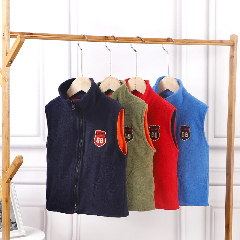 Autumn and winter double-sided wear polar fleece boys and girls vest large, medium and small children thick warm waistcoat whole