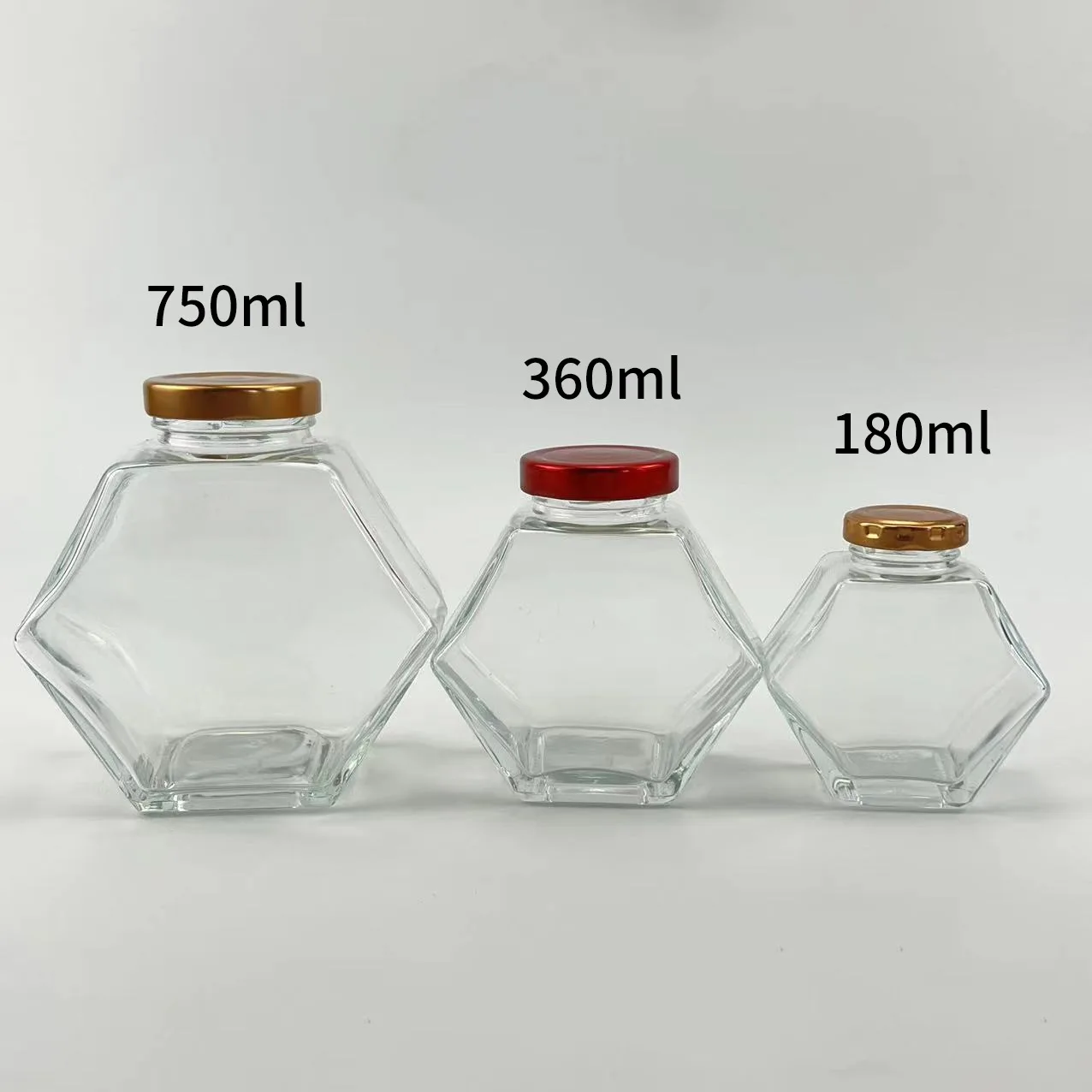 Wholesale Hexagon Glass Honey Container Honey Storage Bottle Glass Honey Jar With Metal Lid