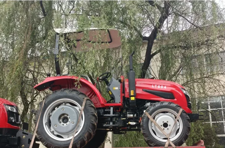 LUTONG Small Farming Tractor 60HP LTB604 4x4 Wheel Tractor with Enclosed Cabin Popular in America