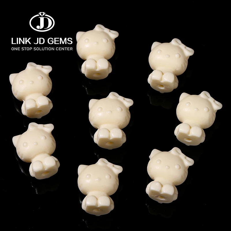 JD Wholesale Handmade Carved Natural Natural Phytelephas Macrocarpa Ivory Nut KT Cat Shape Spacer Beads for Jewelry Making