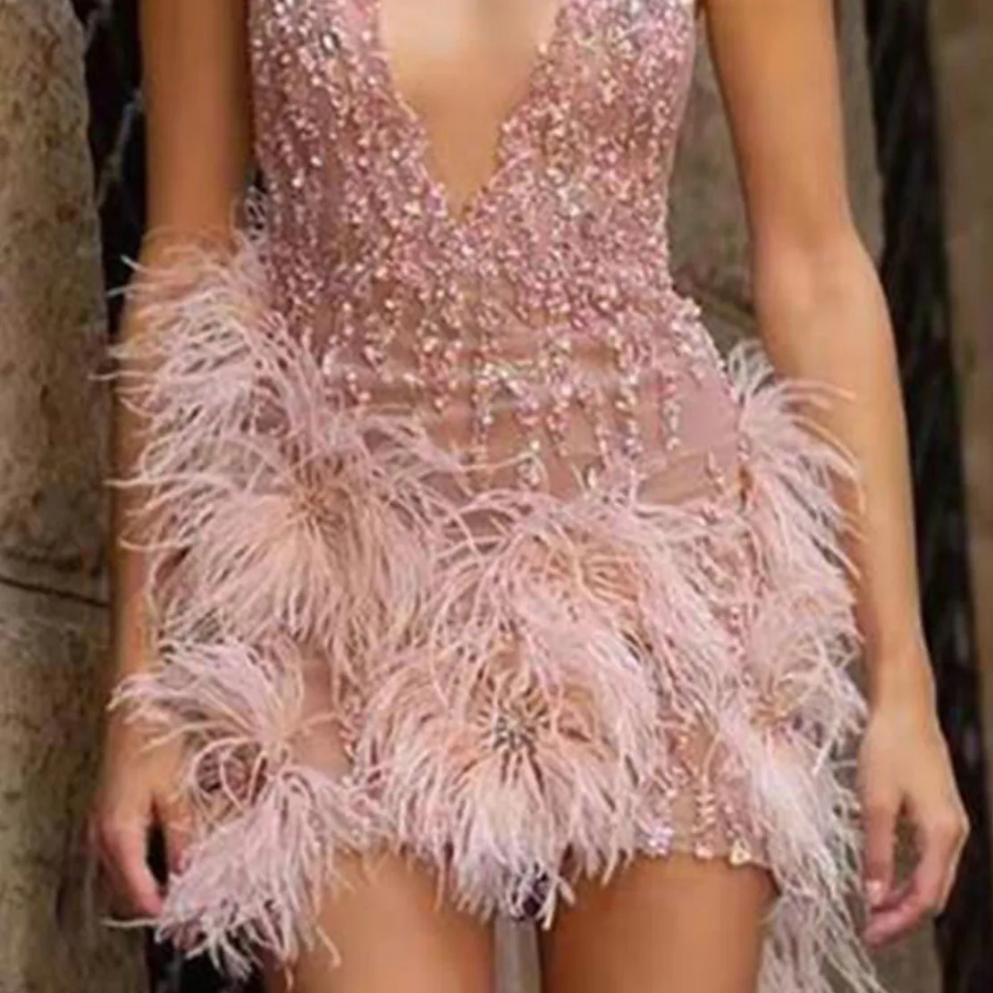 Sexy nightclub party dress feathered halter skirt and deep v-neck tassel dress