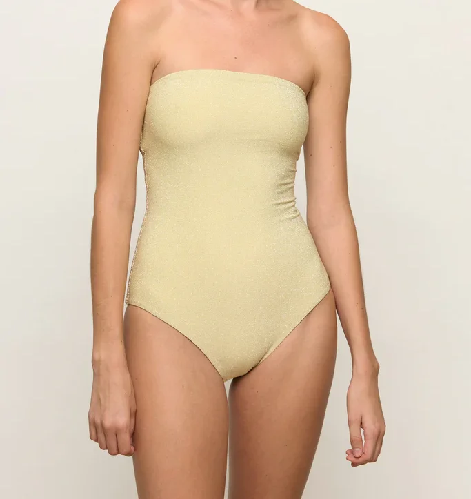 Glittering Pink Strapless Bandeau One-Piece Swimsuit High-Cut Leg Design Shimmering Finish Elegant Eye-Catching Beachside Look