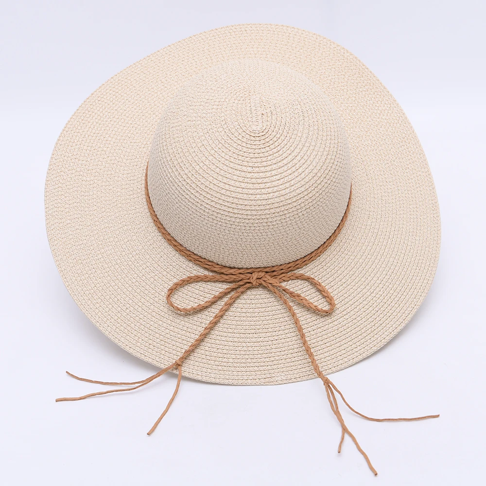 Elegant Floppy Bowknot Travel Cap Sunscreen Large Brim Paper Straw Beach Hat Custom Logo Wholesale Women Foldable Straw Sun Hat