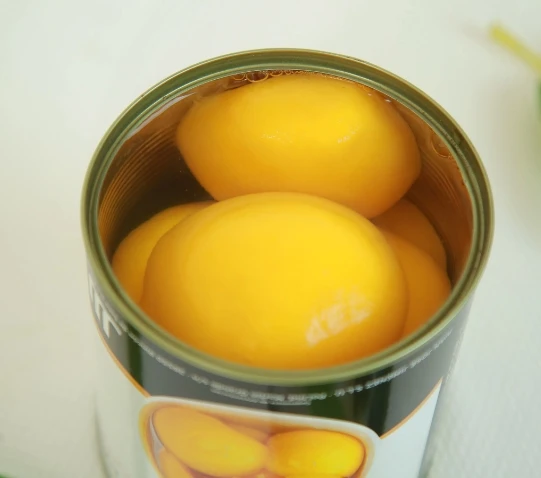 Горячая распродажа свежие консервированные желтые персиковые фрукты в легком сиропе оптом вкусные кости