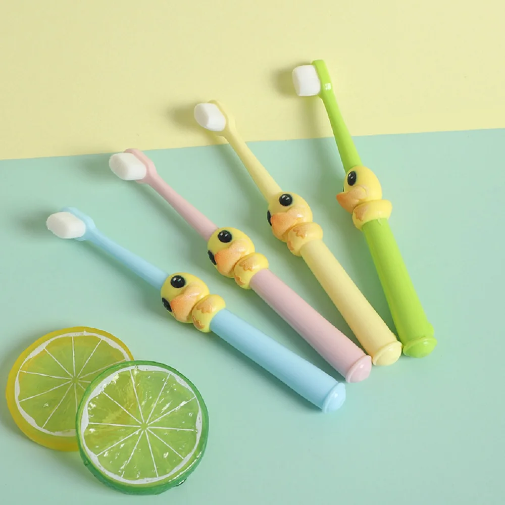 
Lovely duck image 10000 bristles soft rubber handle toothbrush for kids 